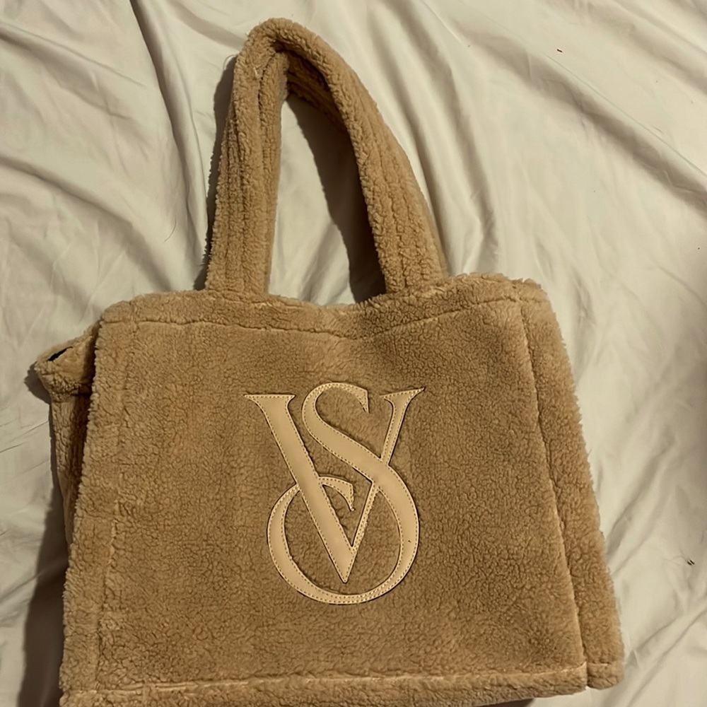 Victoria secret bag with fur on it and leather LV sign